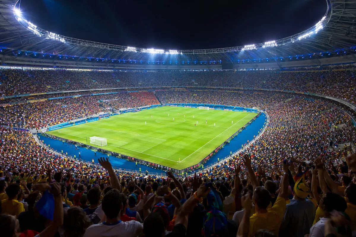 Wide shot of a professional football stadium during a World Cup match, vibrant atmosphere