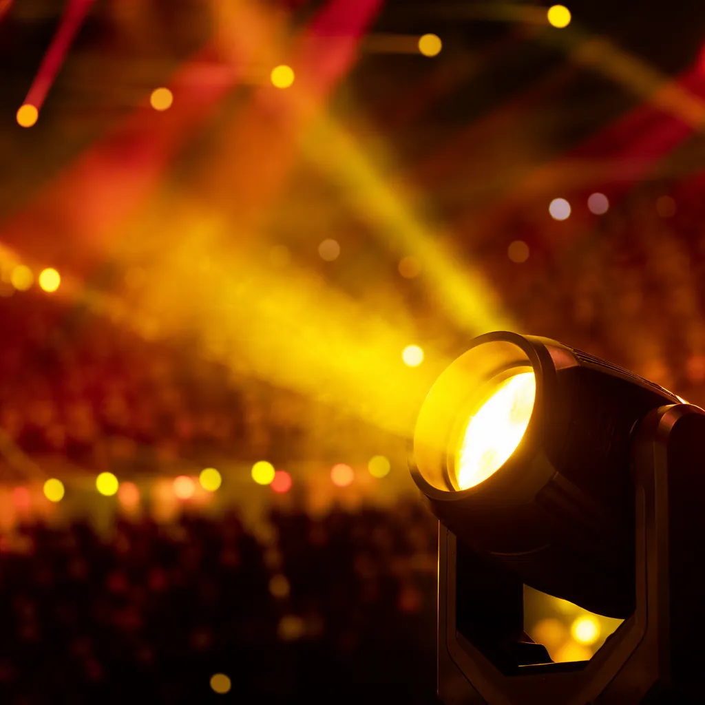 Close up of dynamic stage lighting during a large-scale sports event opening per