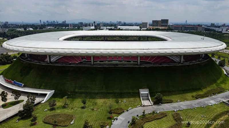 an aerial view of a soccer stadium in a city