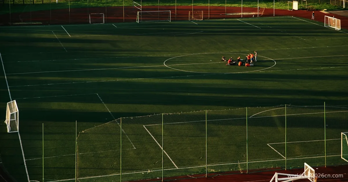 red and black sports car on track field