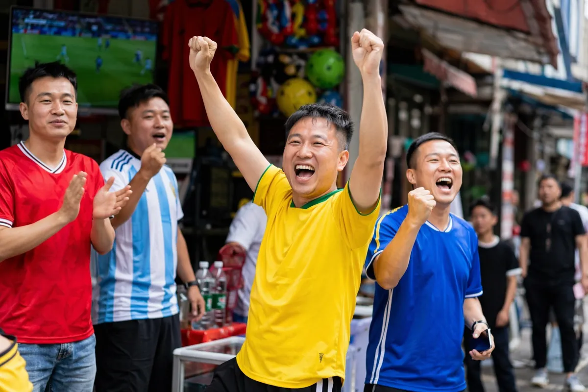 Vibrant street scene in Wenzhou China, colorful small commodity store front, football fans