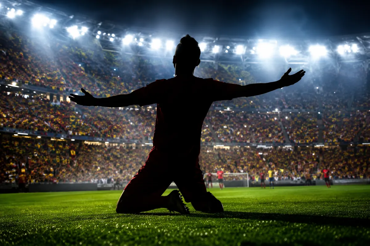 Vibrant World Cup match atmosphere, silhouette of a tall striker celebrating a goal in a l