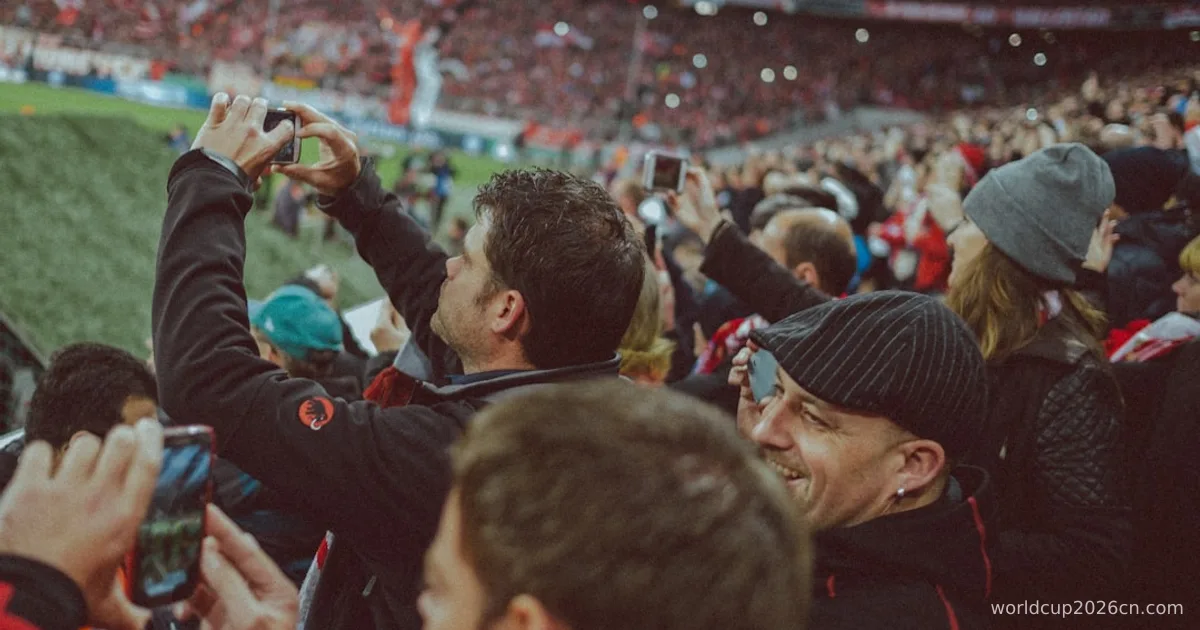 people near green field using smartphones