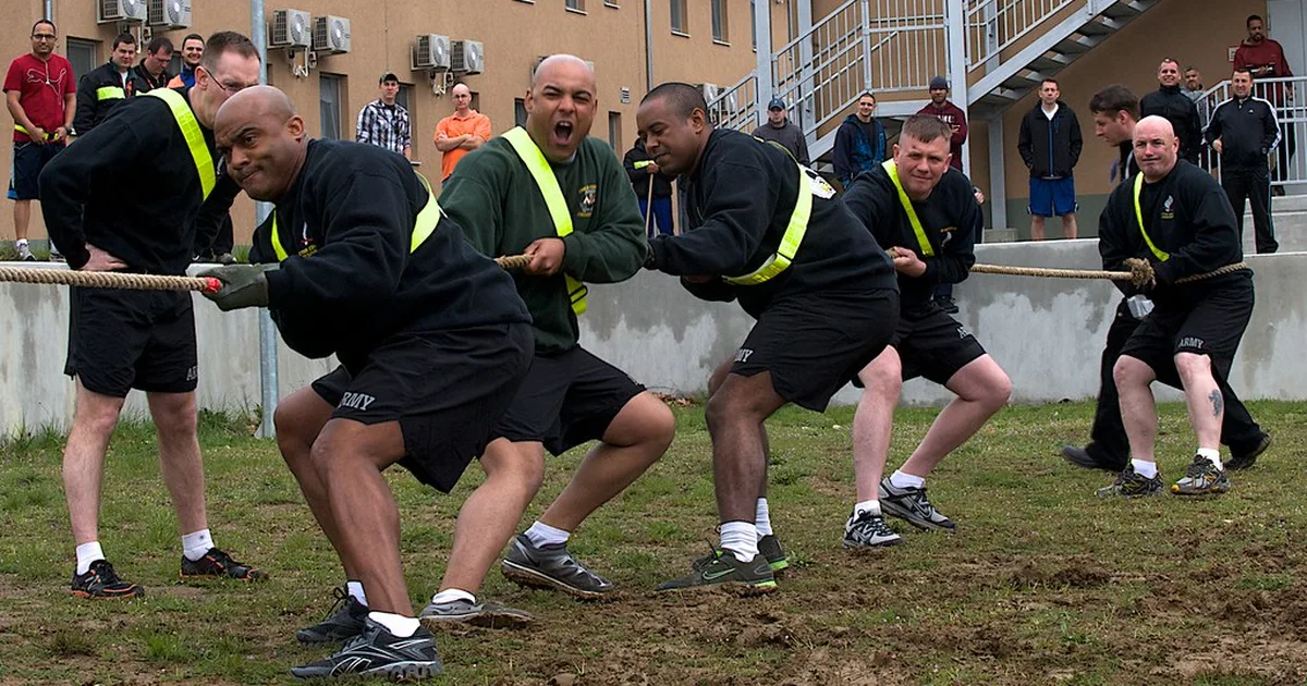 Professional football training ground scene, with players wearing generic blue and black s