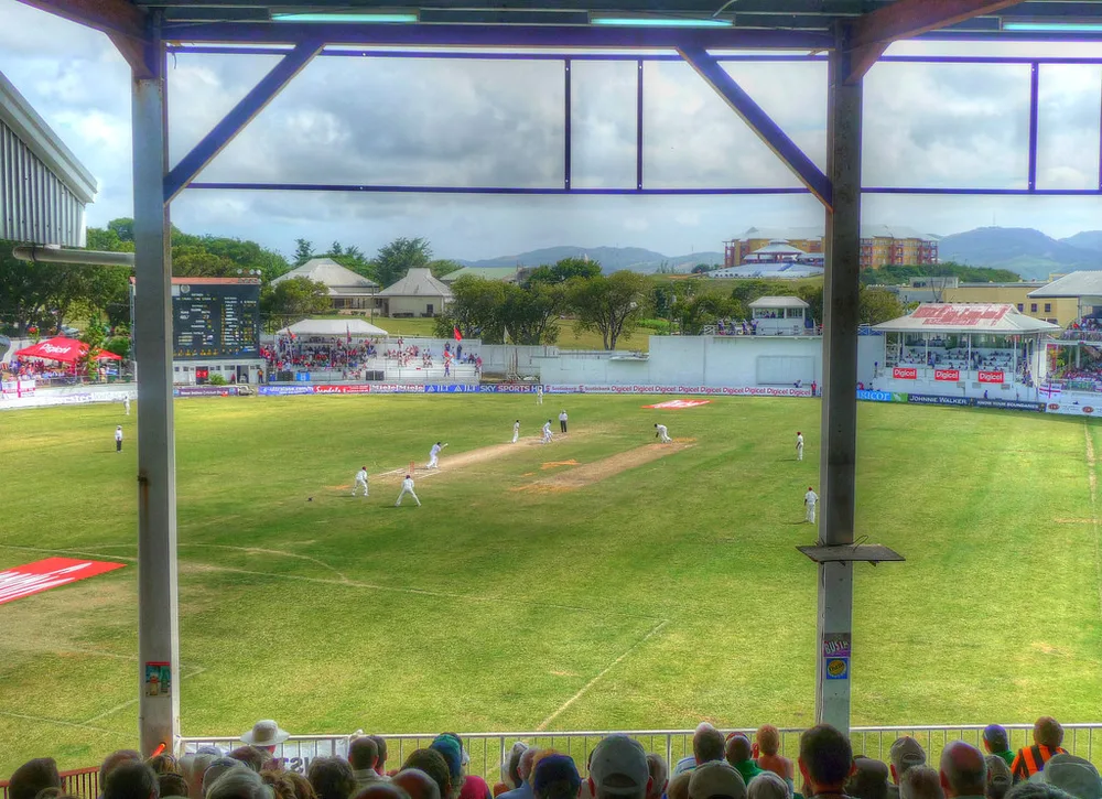 Blurred shot of football club representatives shaking hands in a neutral confere