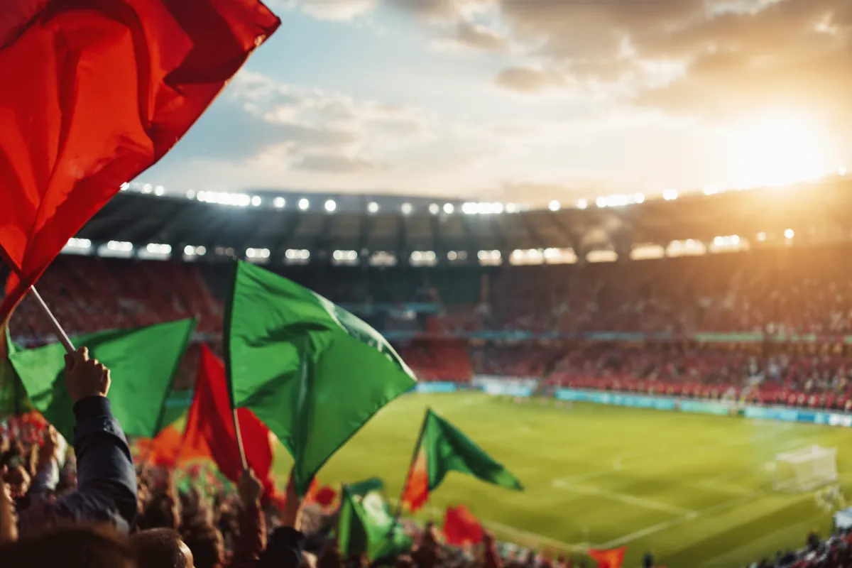 Editorial sports news header, blurred football stadium background with waving red and gree