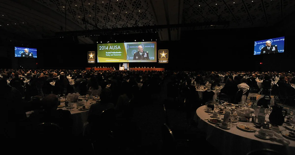 Professional football conference stage with a football placed on the speaking podium, soft